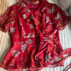 Red floral peplum like blouse